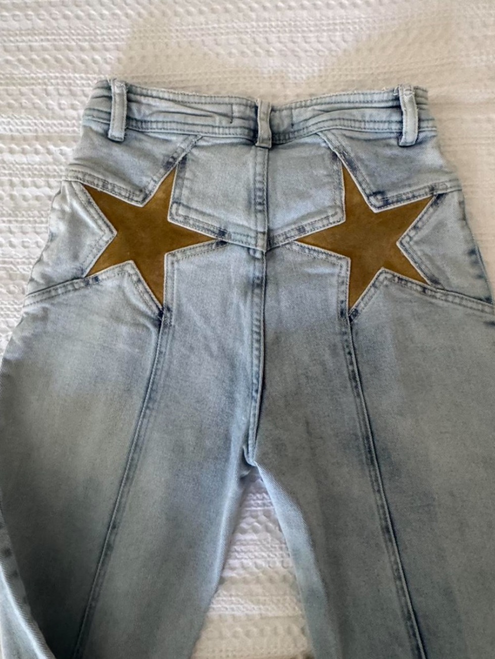 Free People Light Wash High-Rise Jeans with Gold Star Patches